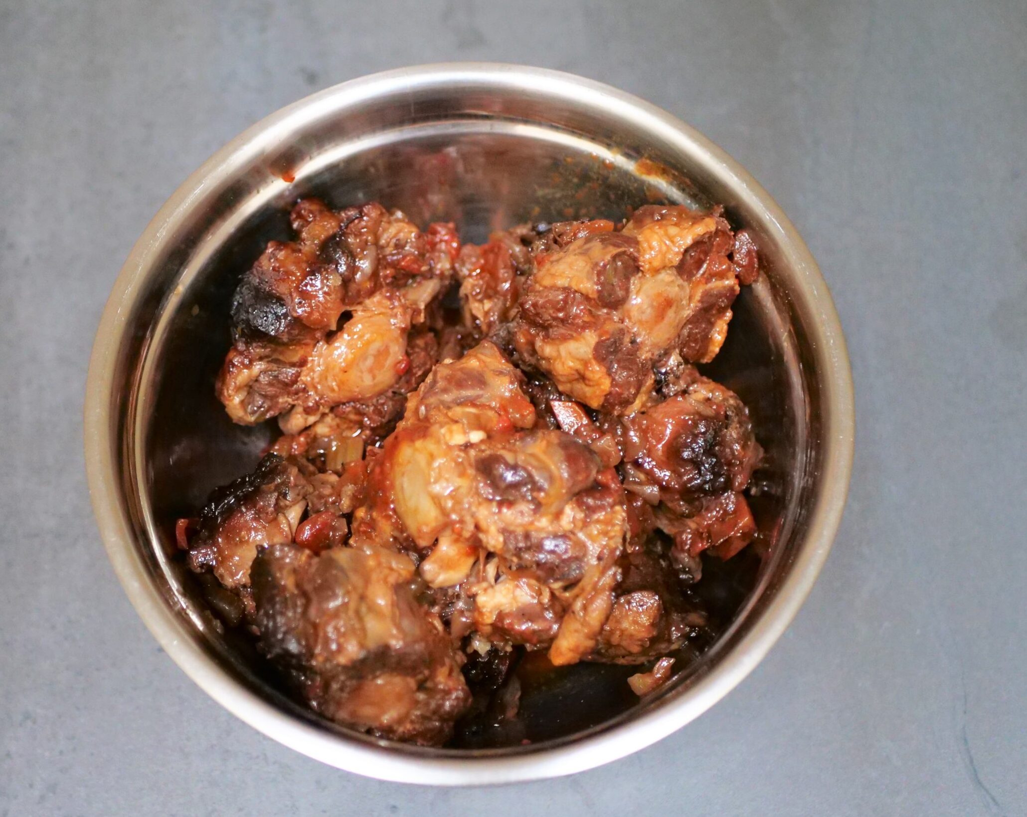 remove braised oxtail from the Dutch oven 