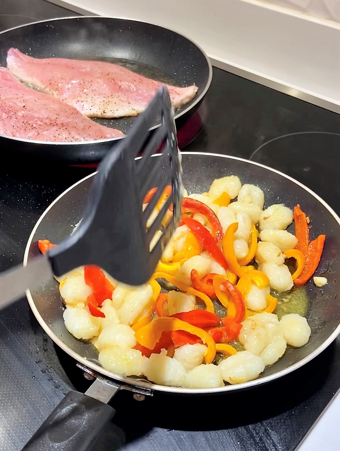 add cooked gnocci to peppers