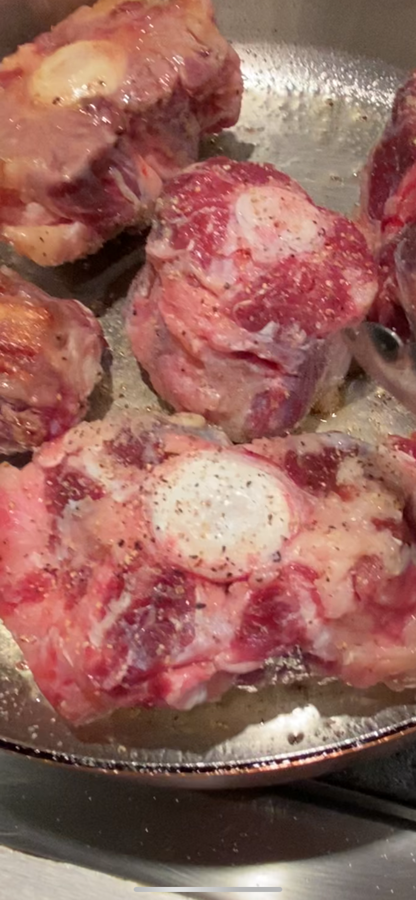 sear oxtail till brown on all sides