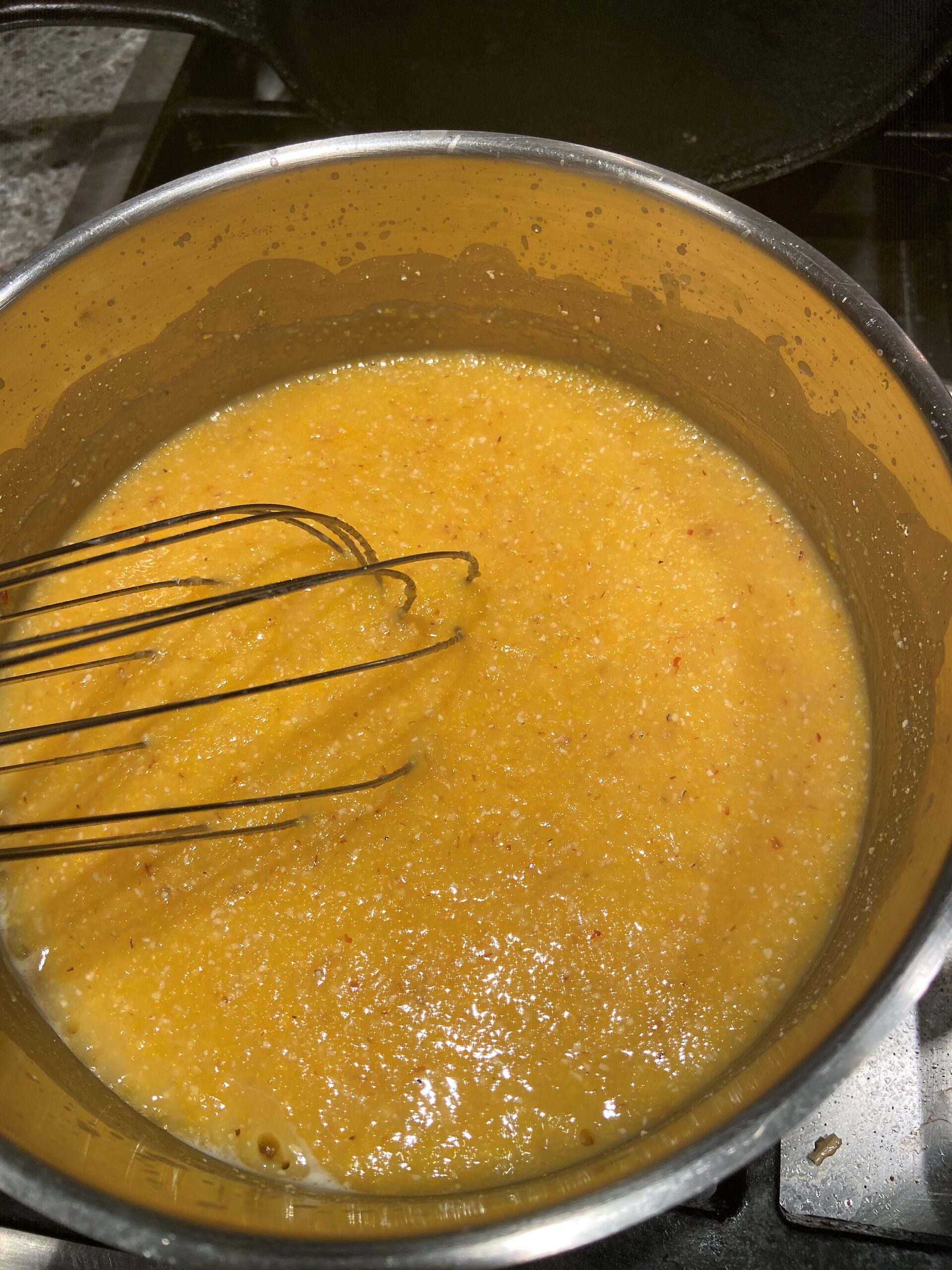 combine cornmeal, water and chicken stock