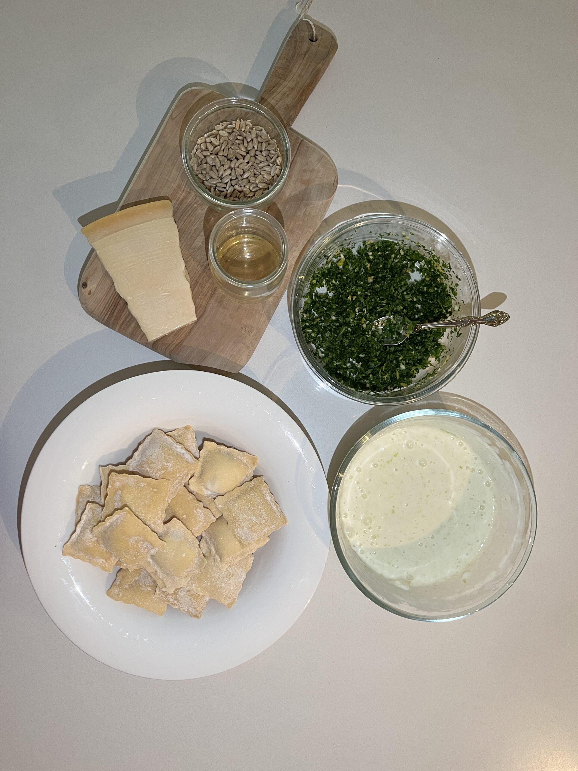 assemble ricotta ravioli, soubise, gremolata