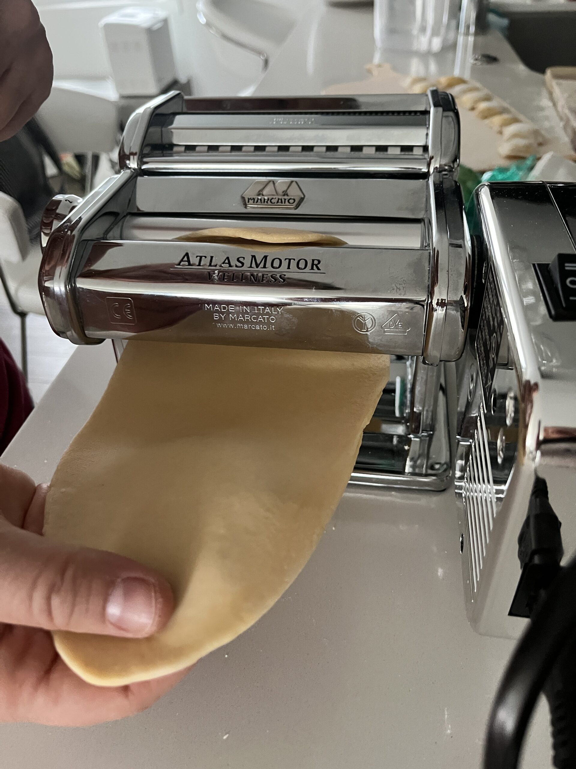 run pasta dough through pasta machine