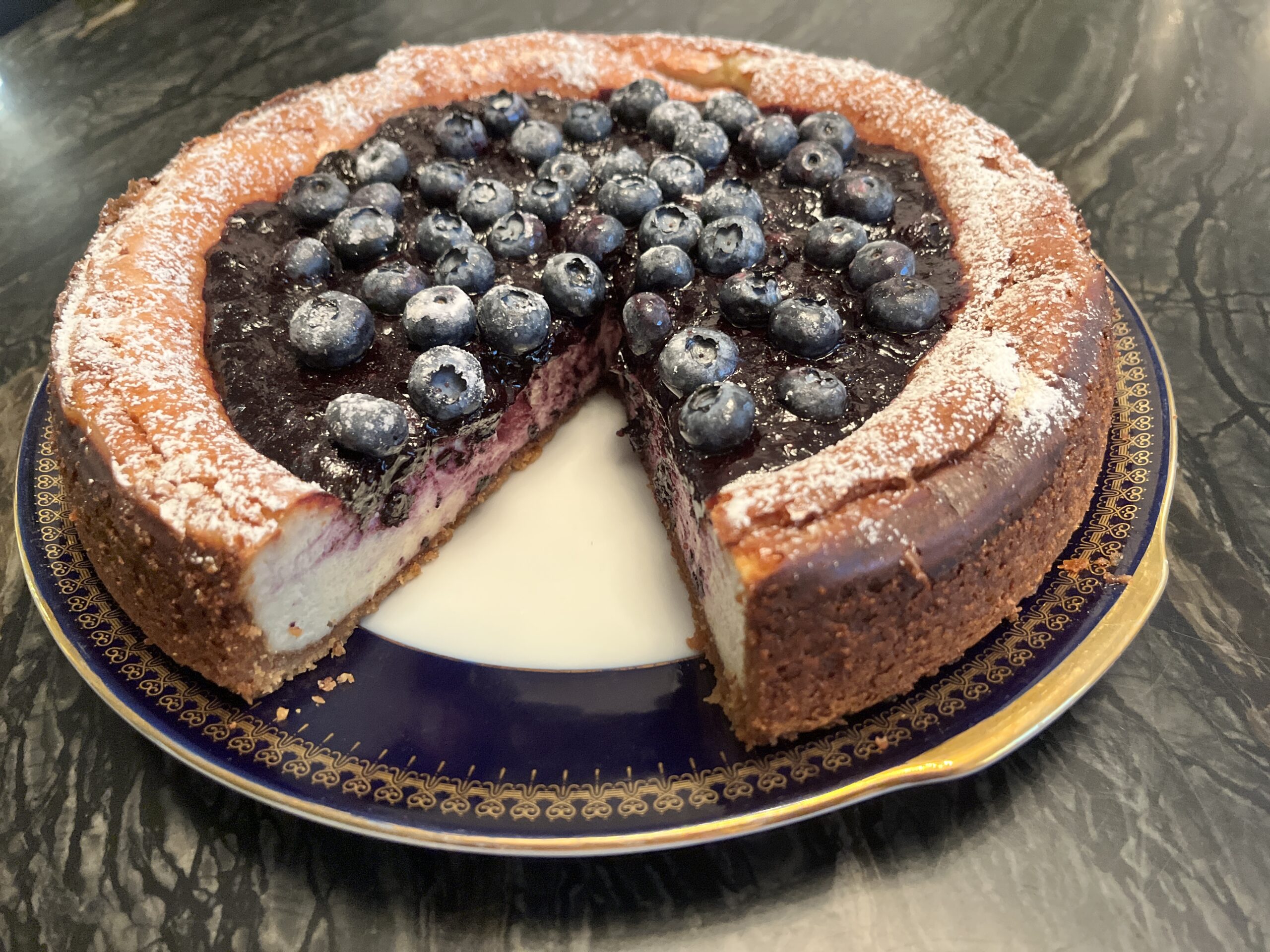 savory cheesecake with lavender-blueberry jam topping