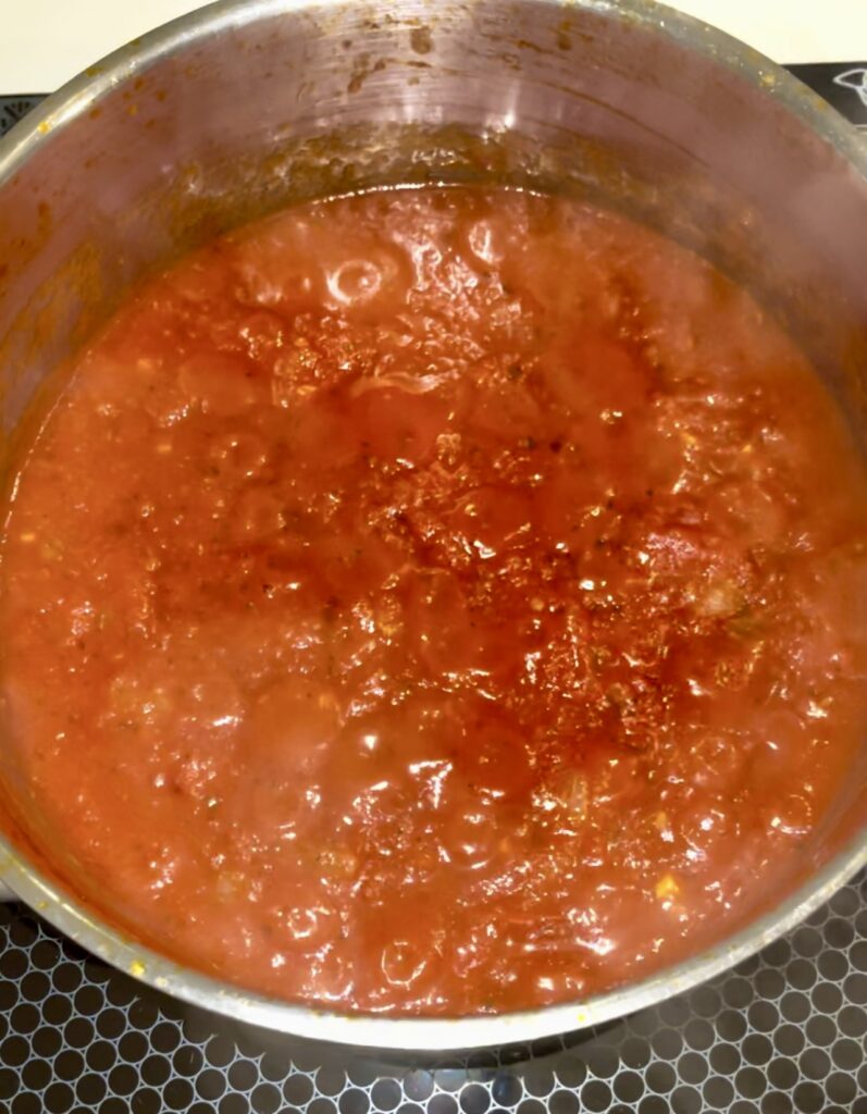 cook tomato sauce for 1 hour